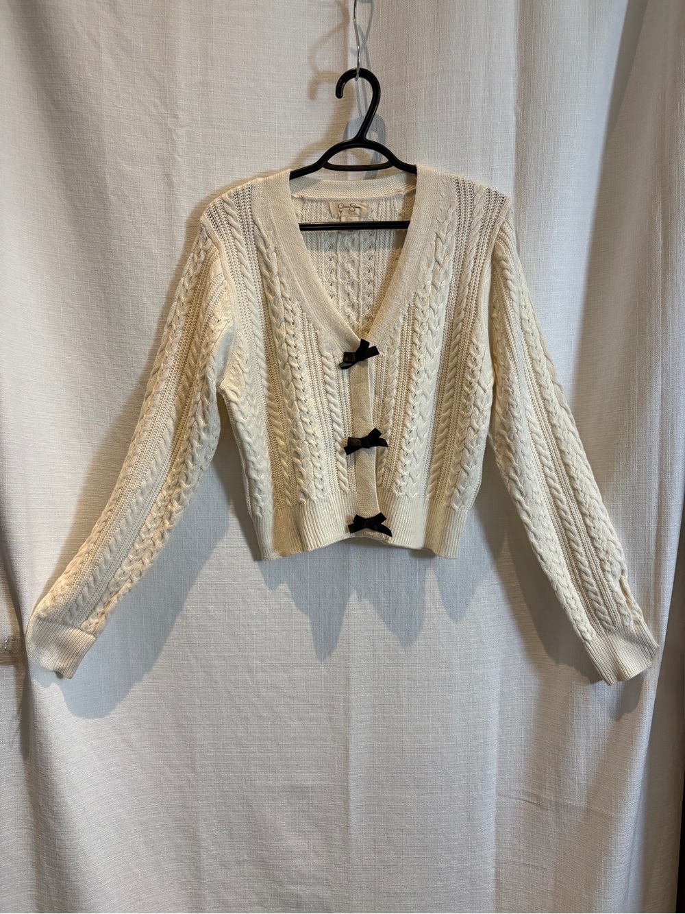 Jessica Simpson Cable-Knit Cropped Bow Cardigan in Cream